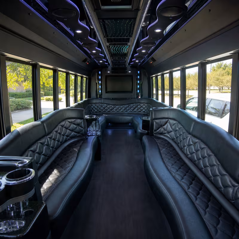 Friends laughing during a Fresno party bus celebration