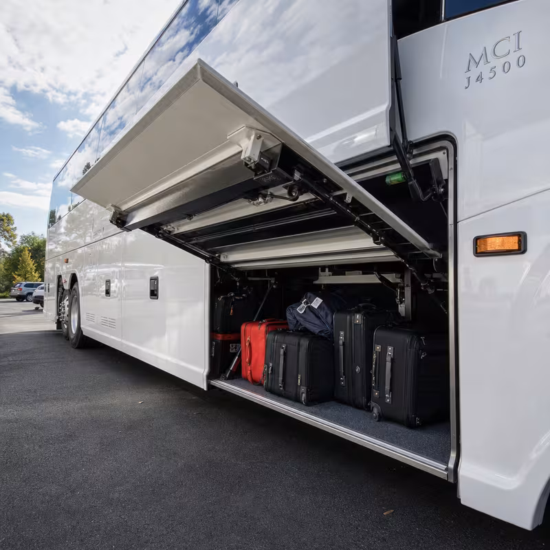 Party bus interior with wraparound leather seating and LED lighting in Fresno