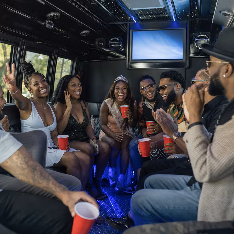 Black Mercedes Sprinter van staged for an Fresno Birthday Transportation group