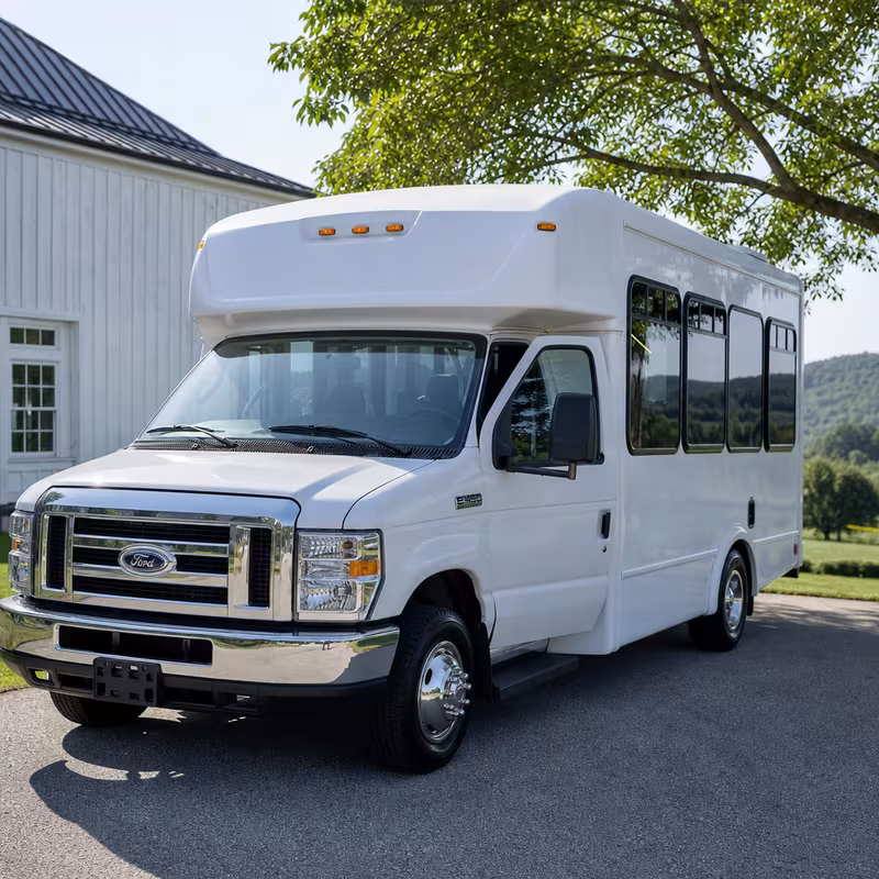 Group boarding a white charter bus for Private Event Transportation transportation in Fresno