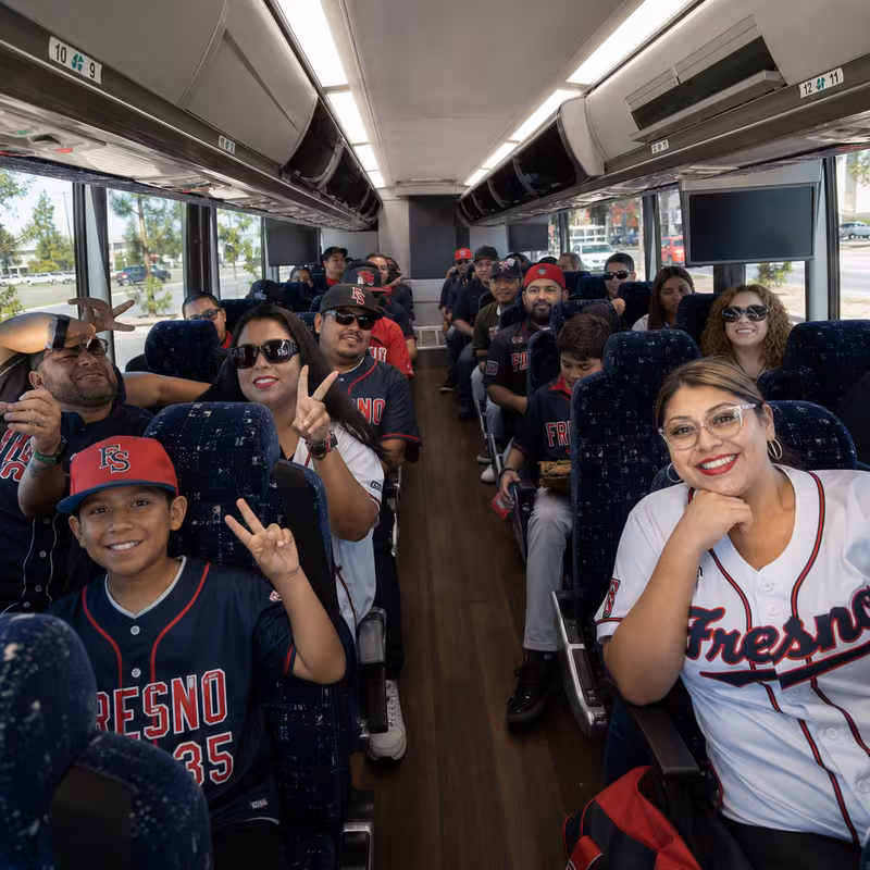 Black Mercedes Sprinter van staged for an Fresno Sporting Event Transportation group